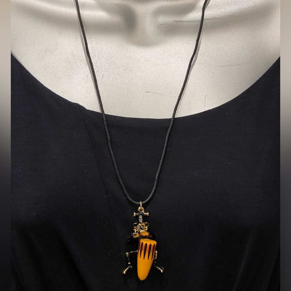 Charles F. Worth Vintage Bakelite Corded African Drummer Pendant Necklace